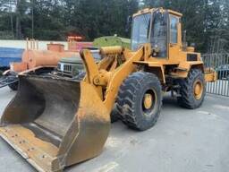 Чистка снега погрузчиком