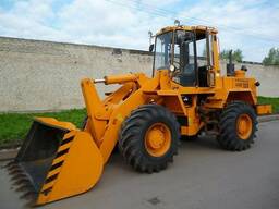 Фронтальный погрузчик амкадор