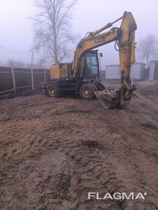 Аренда колесного полноповоротного экскаватора