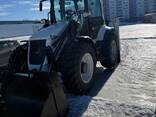Аренда погрузчика-экскаватора, фронтального погрузчика, вилочного погрузчика - фото 1