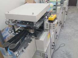 Машина по производству шапочек