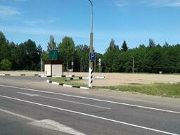 Автостоянка и участок земли