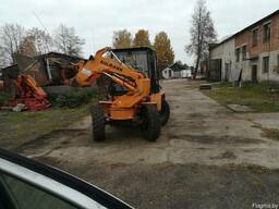 Погрузчик фронтальный со сменным оборудованием